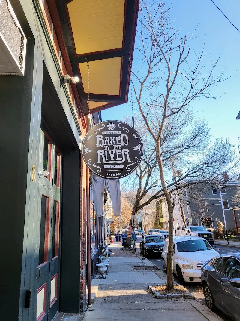Baked By The River Dispensary logo